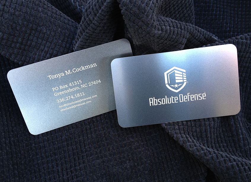 Absolute Defense Metal Business Card